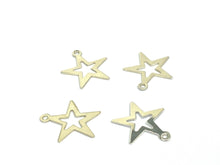 Stunning silver cut out star charm , Sku #500C23